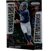 A blue and white 2025 panini prizm #7 abdul carter fireworks football card featuring carter in a new york giants uniform
