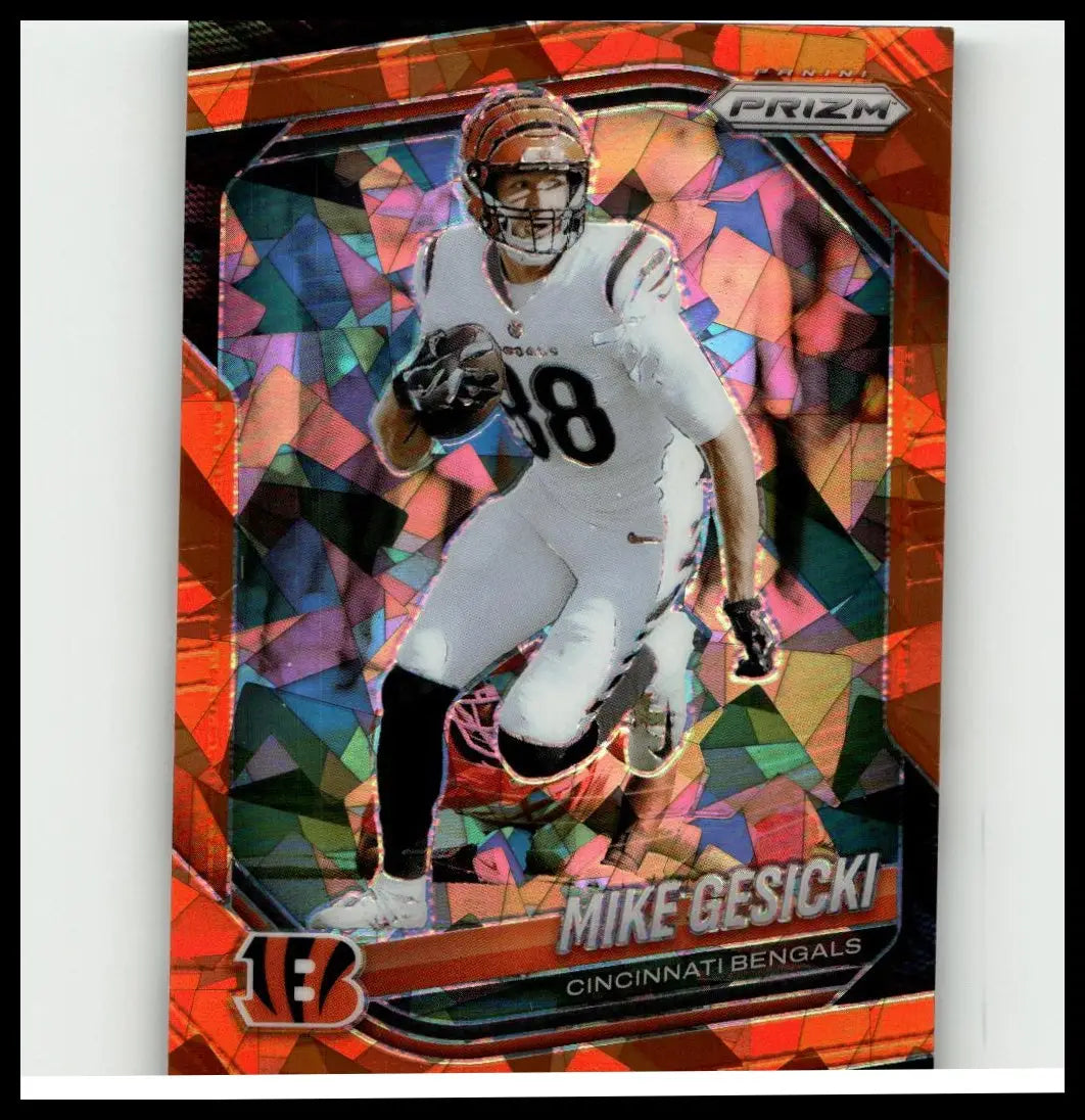 A 2025 panini prizm #79 mike gesicki orange ice trading card showing mike gesicki in cincinnati bengals white uniform