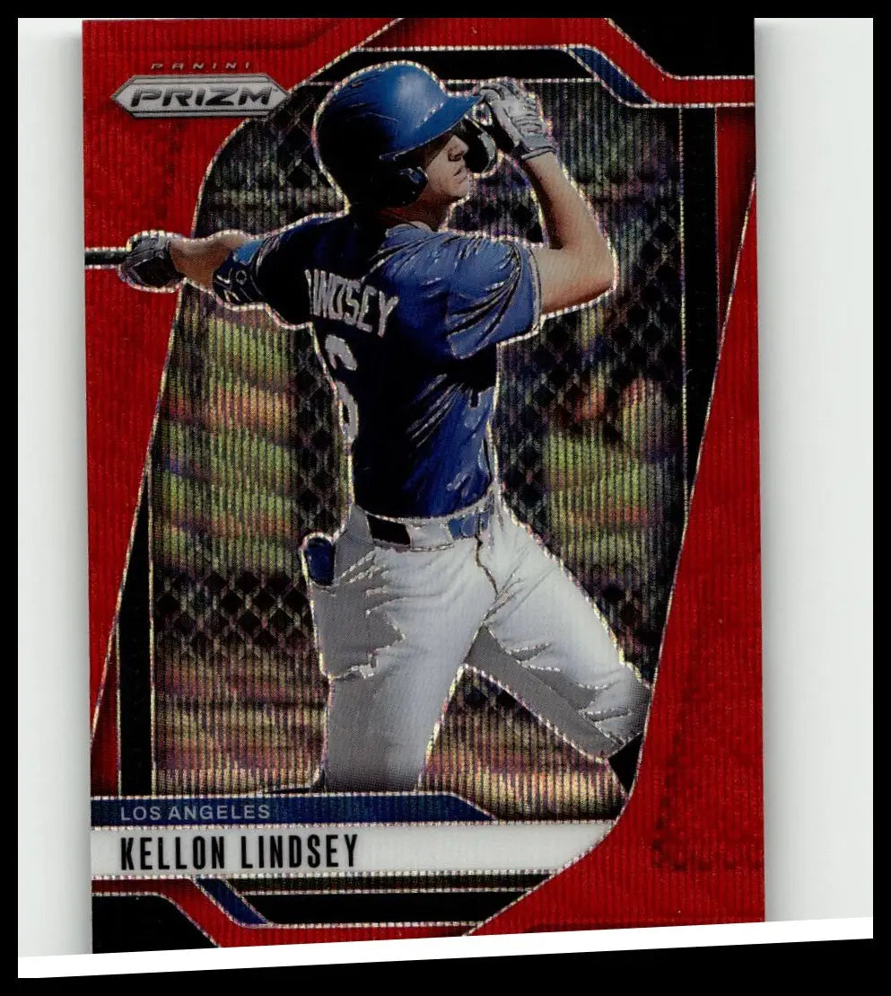 A red and black 2025 panini prizm baseball trading card featuring kellon lindsey in a blue jersey mid-swing with ruby wave prisms