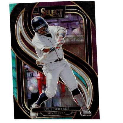 A glossy, iridescent baseball trading card featuring kyle debarge in a white uniform and blue helmet mid-swing.