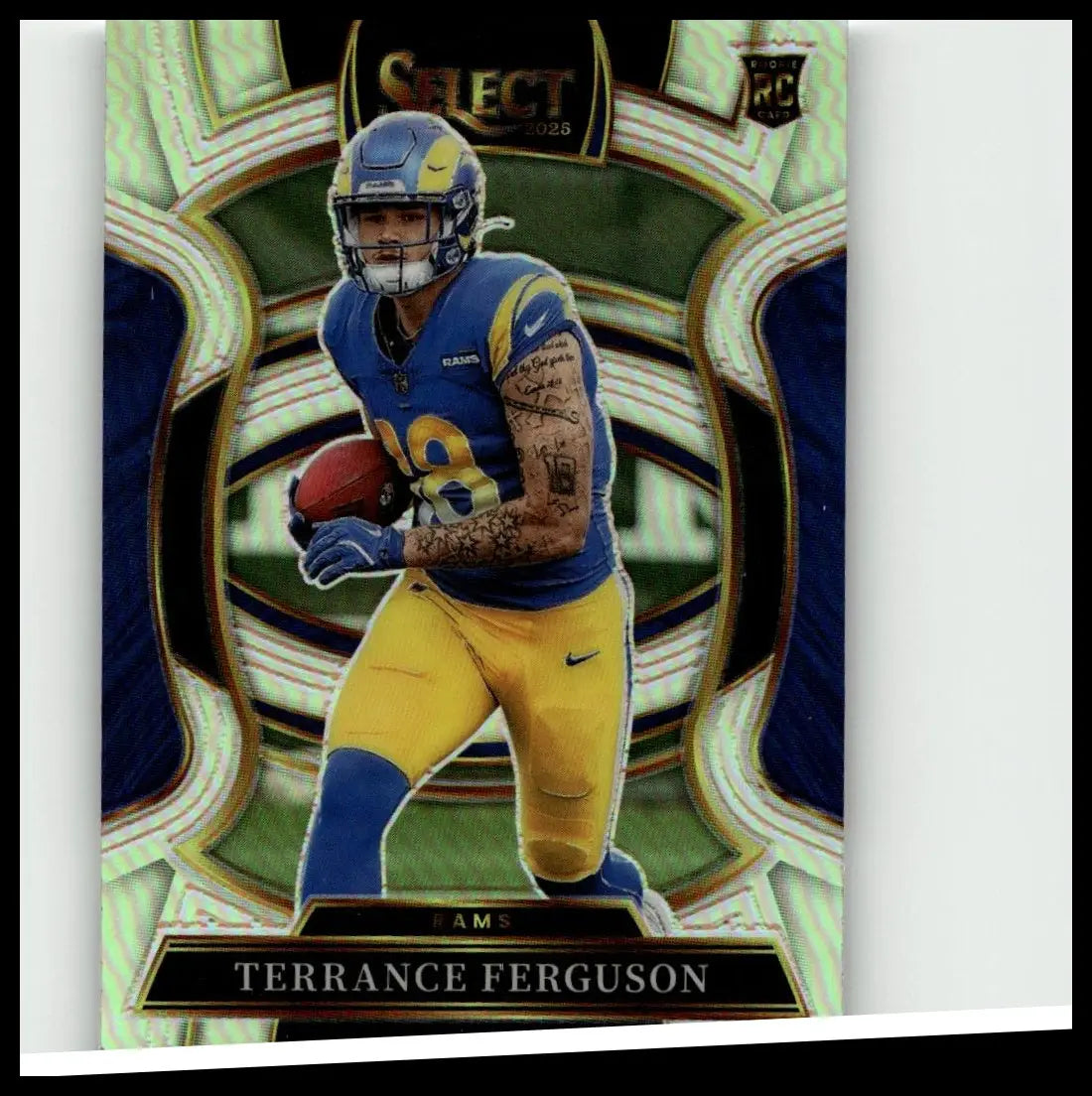 Blue and gold los angeles rams football trading card featuring terrance ferguson in terrance ferguson silver prizm uniform