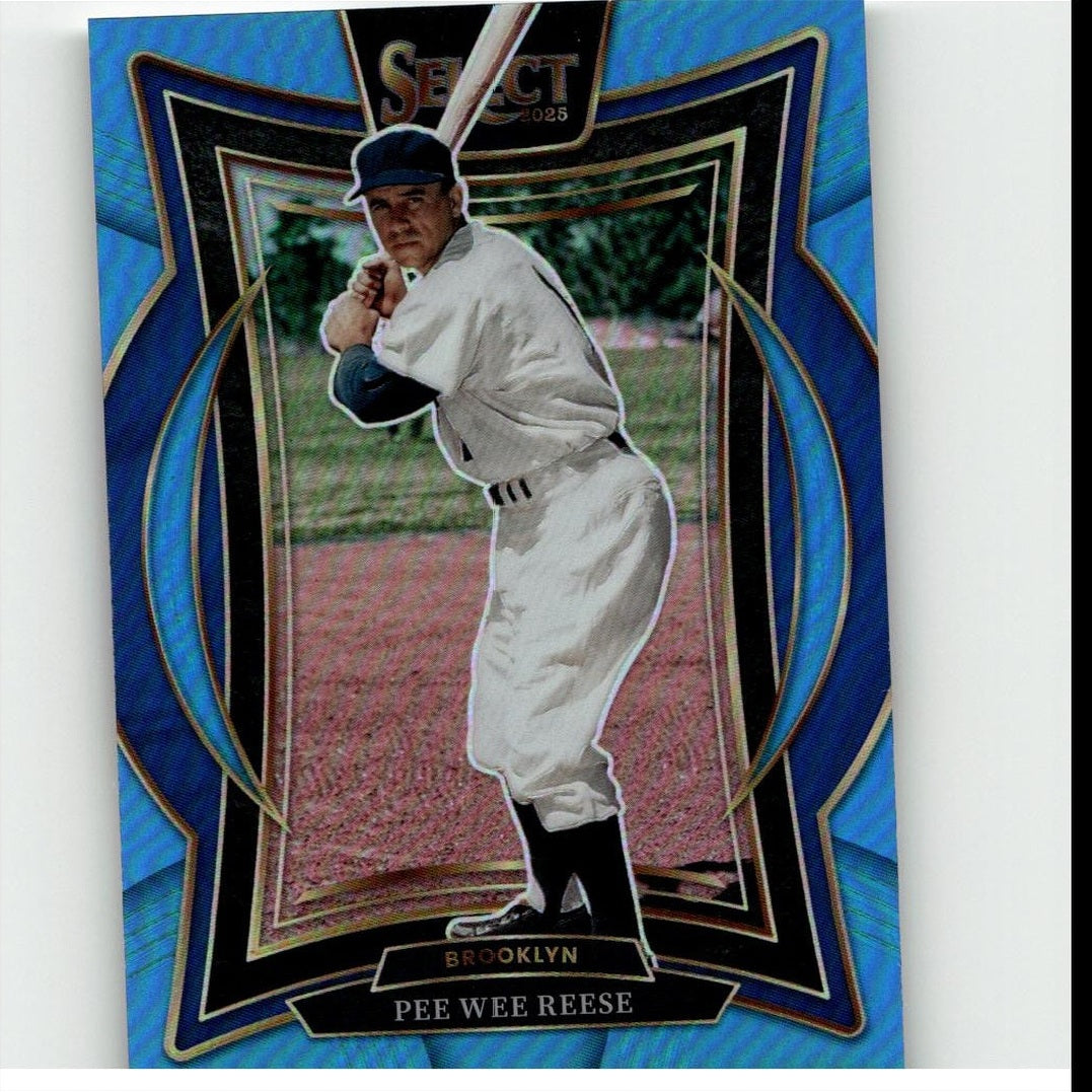 Blue and black framed baseball trading card featuring pee wee reese in a white uniform with navy cap, holding bat.