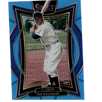 Blue and black framed baseball trading card featuring pee wee reese in a white uniform with navy cap, holding bat.