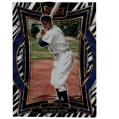 A 2025 panini select 24 pee wee reese zebra vintage baseball card with ornate blue and gold border on zebra stripes background