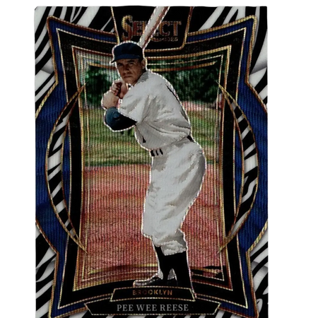 A vintage baseball trading card featuring pee wee reese in a white brooklyn uniform with black accents, set against an ornate blue and gold zebra-striped border.