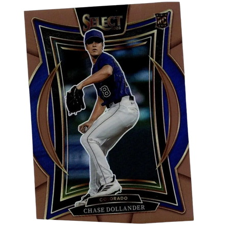 Bronze and blue framed baseball trading card featuring chase dollander in a colorado rockies uniform.