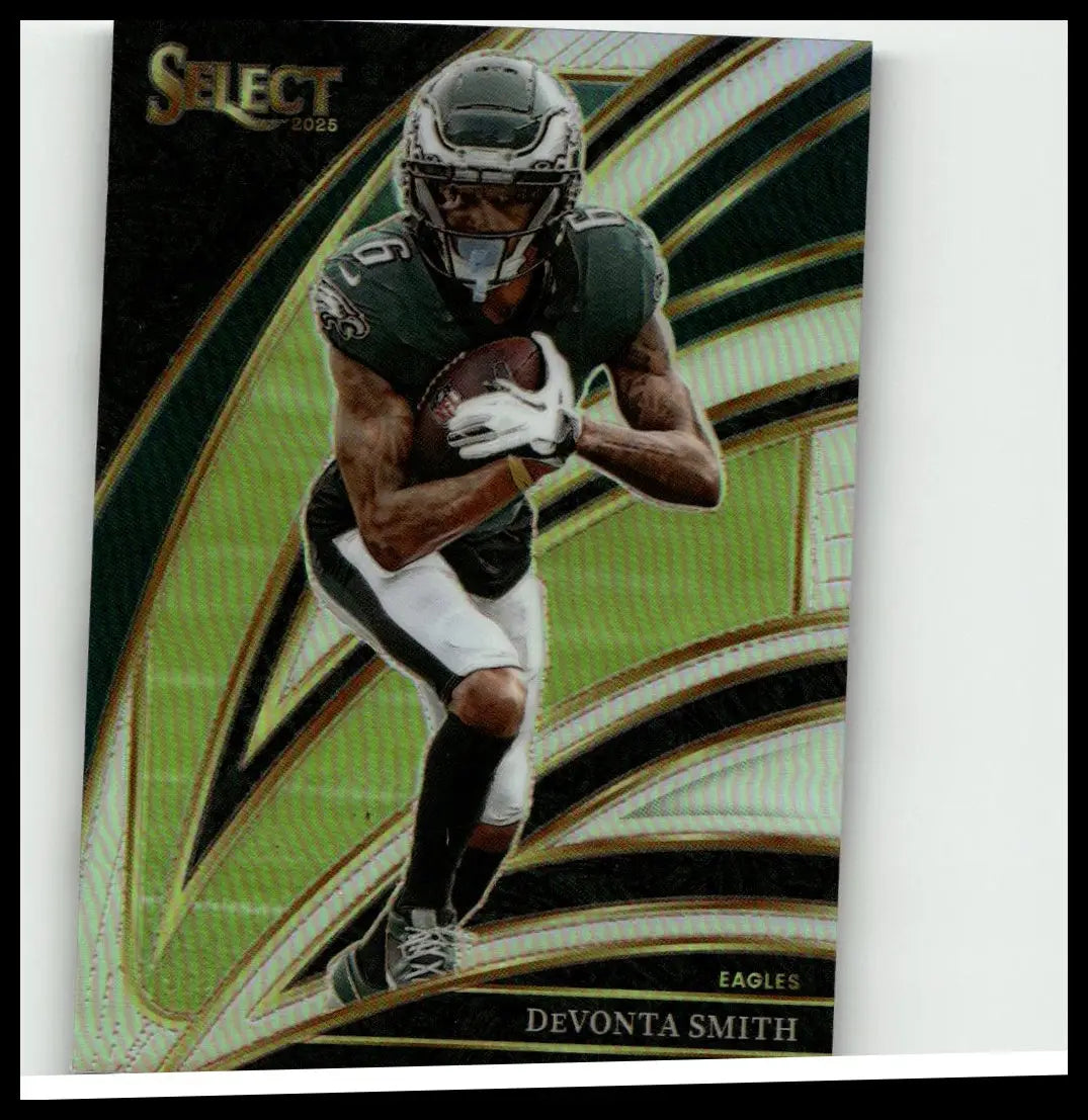 2025 panini select devonta smith silver prizm football card shows smith mid-dash in green black eagles uniform with gold accents