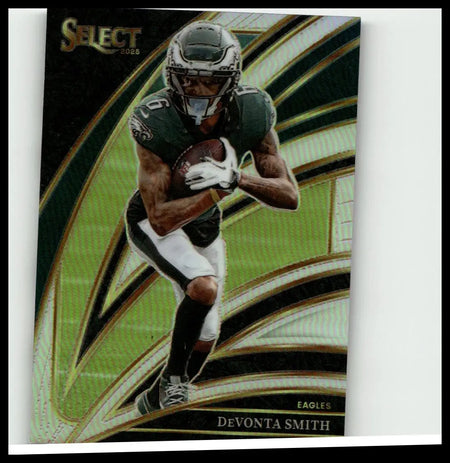 2025 panini select devonta smith silver prizm football card shows smith mid-dash in green black eagles uniform with gold accents