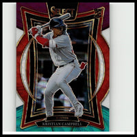 A glossy baseball trading card featuring kristian campbell in a gray uniform with red accents, holding a bat mid-swing against an ornate red and black border design.