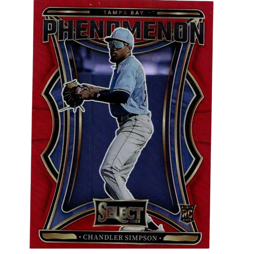 Red and blue tampa bay phenomenon baseball trading card featuring chandler simpson in a light blue jersey, gray pants, white cap with visor, black batting gloves, and gold-trimmed design elements.