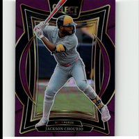 Purple and gold-bordered baseball trading card featuring jackson chourio in a gray milwaukee brewers uniform with yellow helmet accents.