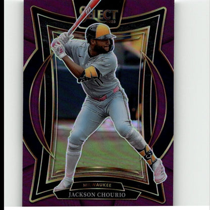 Purple and gold-bordered baseball trading card featuring jackson chourio in a gray milwaukee brewers uniform with yellow helmet accents.