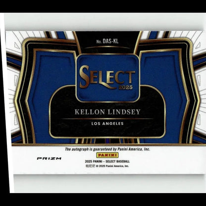 Blue and black baseball trading card with gold lettering, featuring ’select 2025’’ and player kellon lindsey from los angeles.