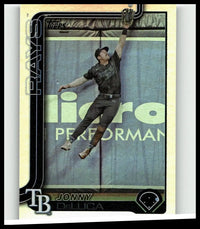Black 2025 topps baseball card featuring jonny deluca rainbow foil in mid-air catch with rays design