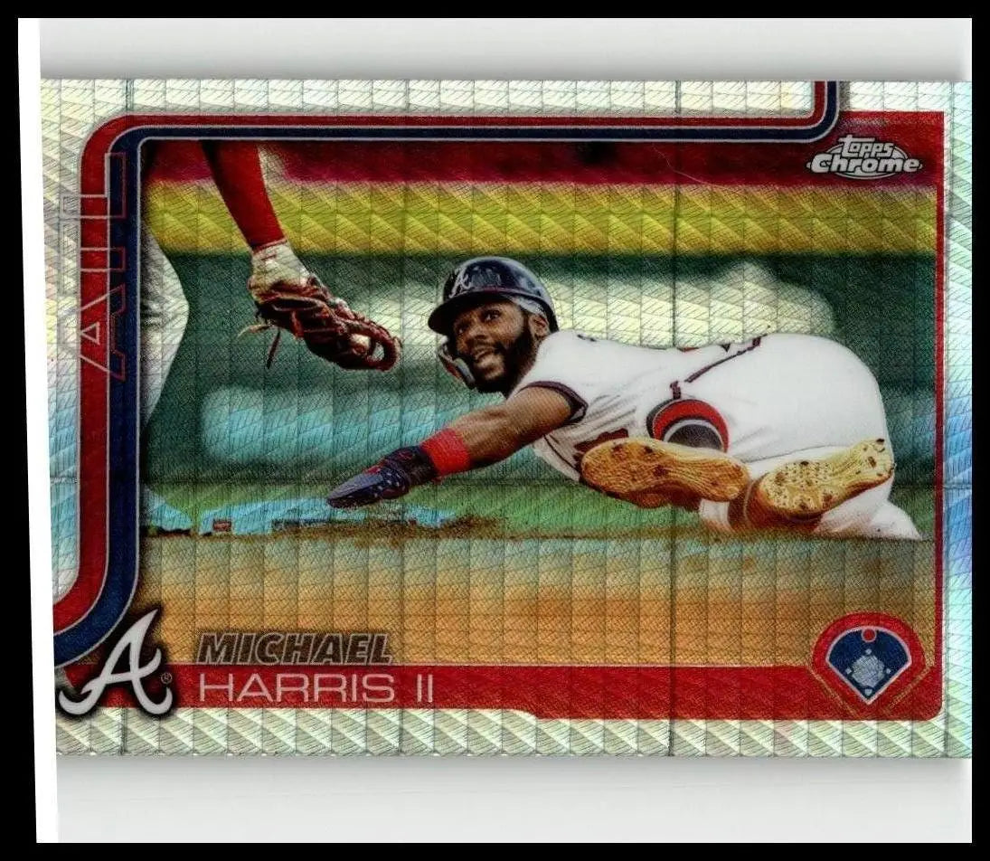 A topps chrome 2025 baseball card featuring michael harris ii in white atlanta braves uniform mid-slide harris ii prism
