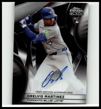 Blue helmeted baseball player orelvis martinez in gray uniform holding bat featured on 2025 topps chrome black card