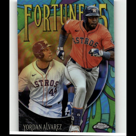 Orange and white houston astros baseball trading card featuring player yordan alvarez in action.