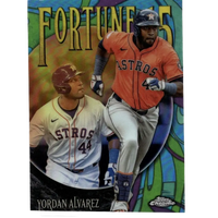 Orange and white houston astros baseball trading card featuring player yordan alvarez in action.