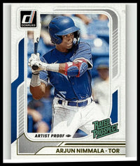 Blue helmeted arjun nimmala mid-swing on 2026 donruss 154 artist proofs nimmala artist proofs card number 25