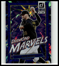A vibrant holographic 2026 Donruss paul skenes diamond marvels baseball card with blue xplosion background