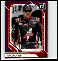 Purple and red bordered donruss trading card featuring nascar driver cole custer in black red and white suit cole custer purple