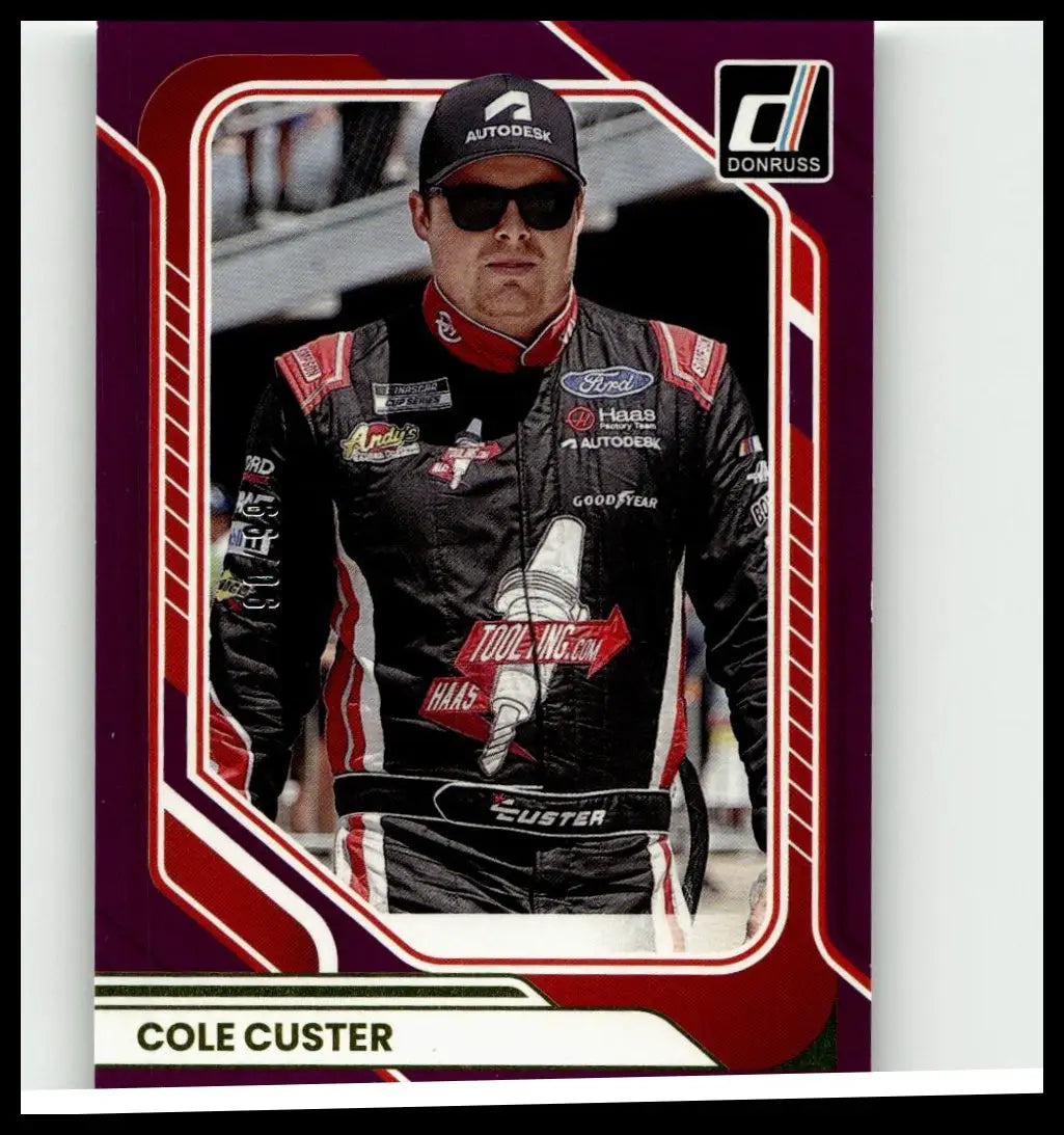 Purple and red bordered donruss trading card featuring nascar driver cole custer in black red and white suit cole custer purple