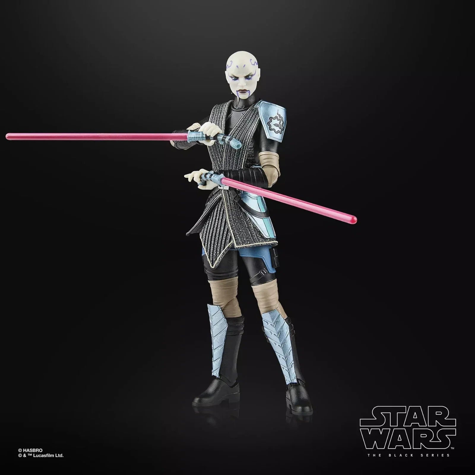 A star wars the black series action figure of asajj ventress, featuring a pale complexion with dark markings and wearing black, silver, and blue armor accented by tan straps, holding two pink lightsabers.