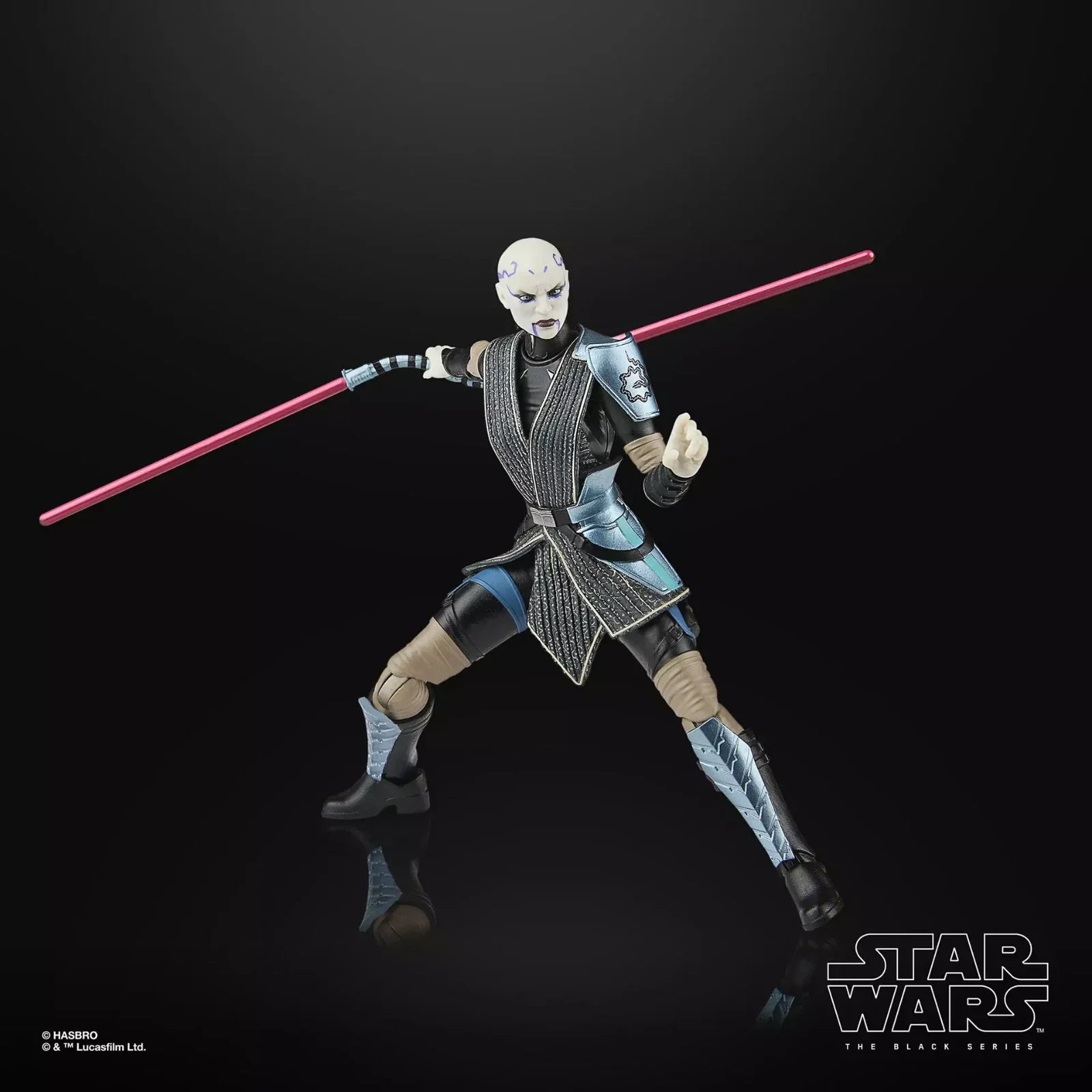 A detailed hasbro star wars the black series action figure of asajj ventress, featuring her signature white face paint and black-and-silver armored outfit with a red lightsaber.