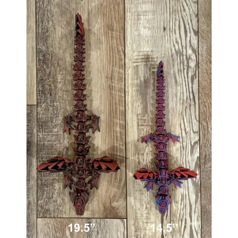 Two decorative, rose-themed swords.