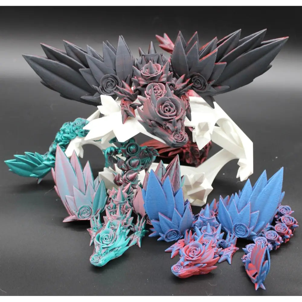 Colorful 3D-printed dragon figurines.