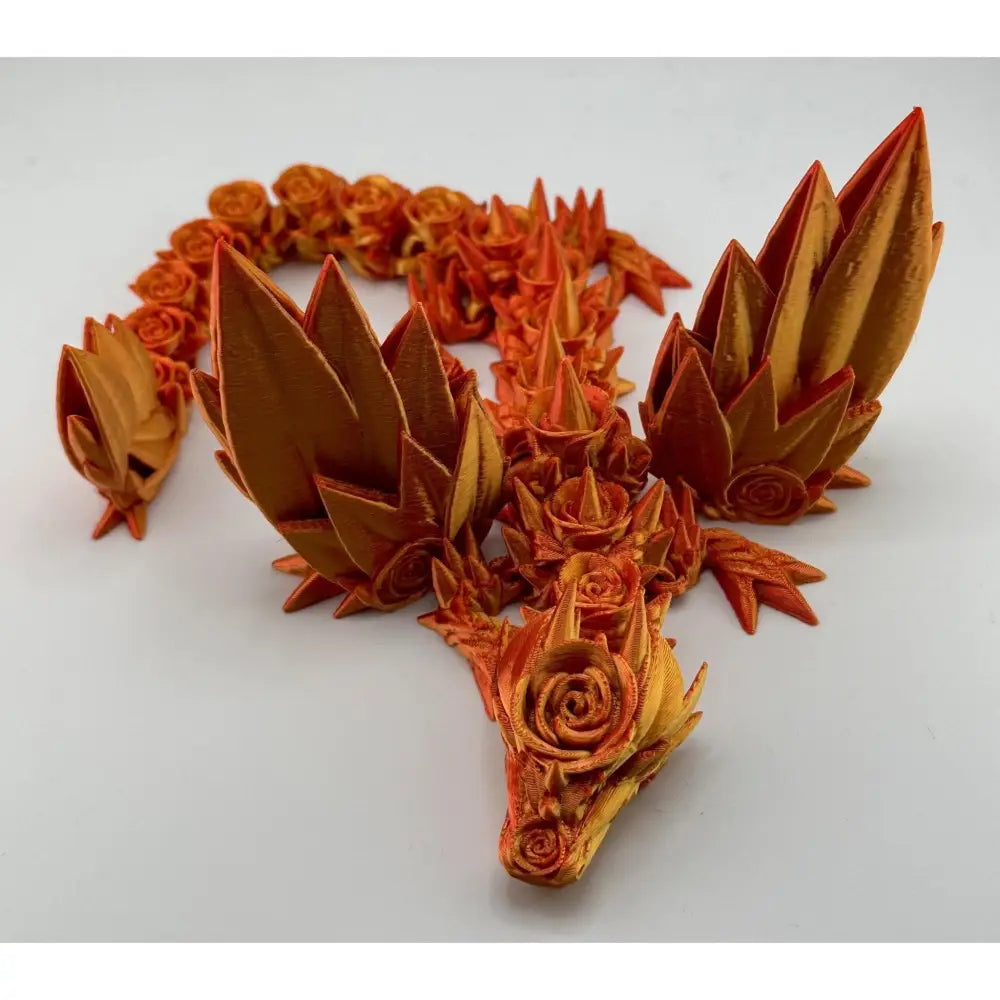 Orange rose-themed articulated dragon.