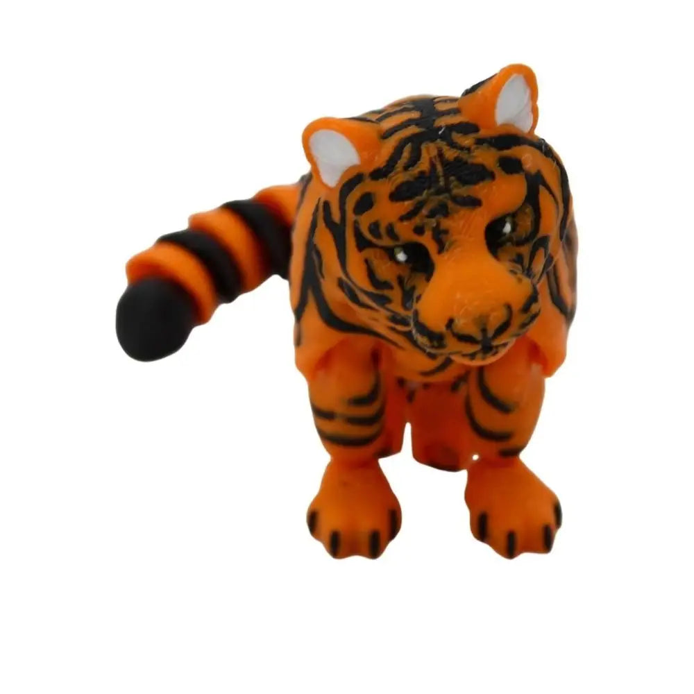 Orange and black toy tiger.