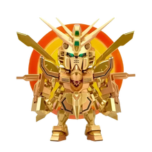 Golden gundam model with green accents and angular metallic design from bandai qmsv mini gold team gundam blind box