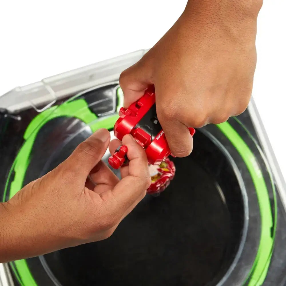 Red metallic fishing reel with green accents and clear plastic handle