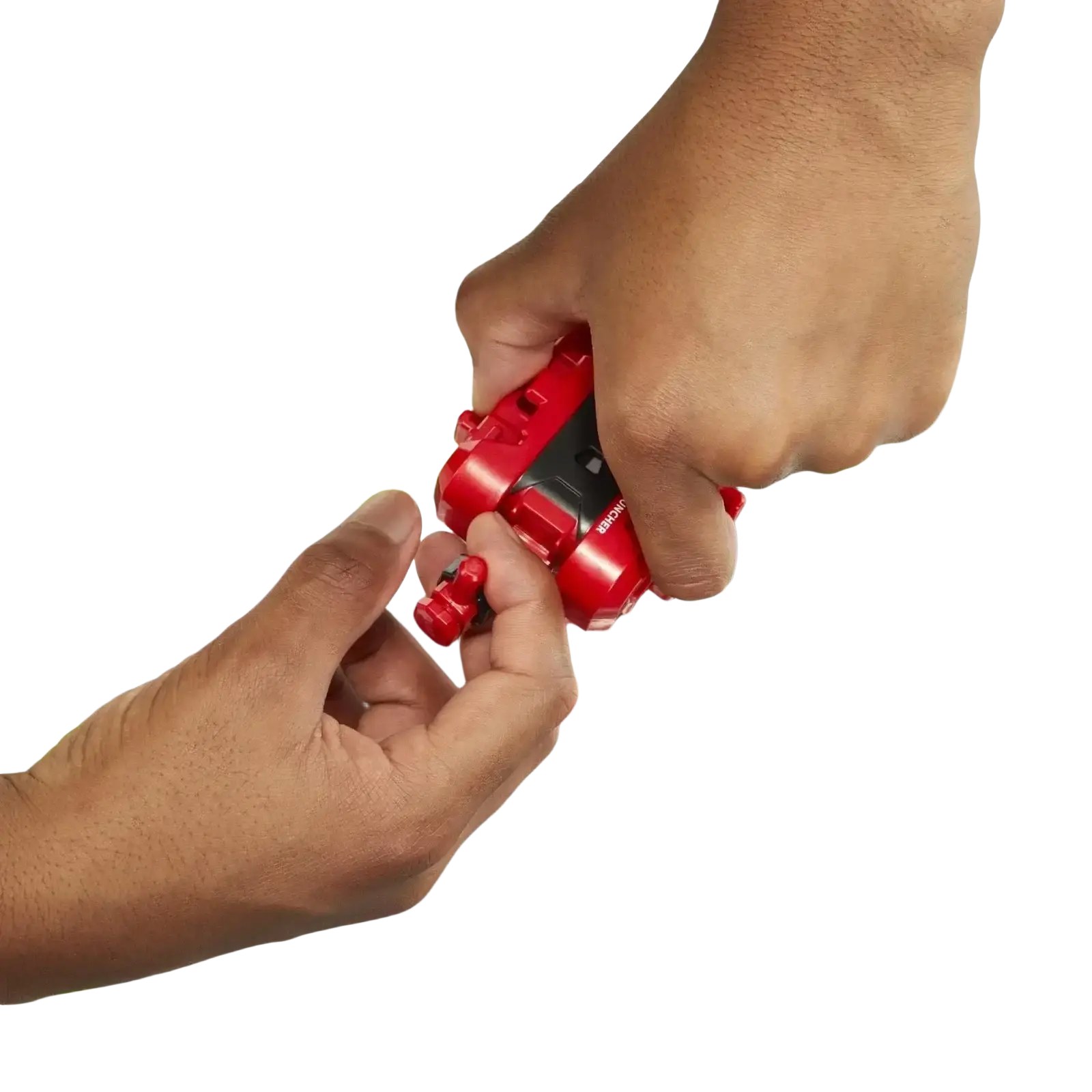 Red and black beyblade launcher being held by a hand above its arena.