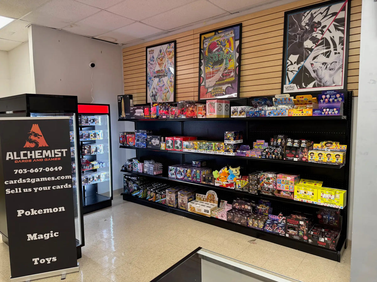 Black metal shelving unit displaying a variety of collectible card game boxes and toys.