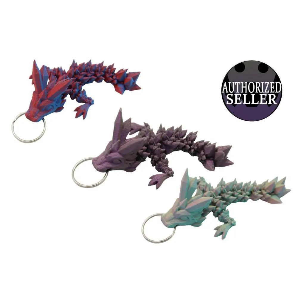Three crystal dragon keychains.