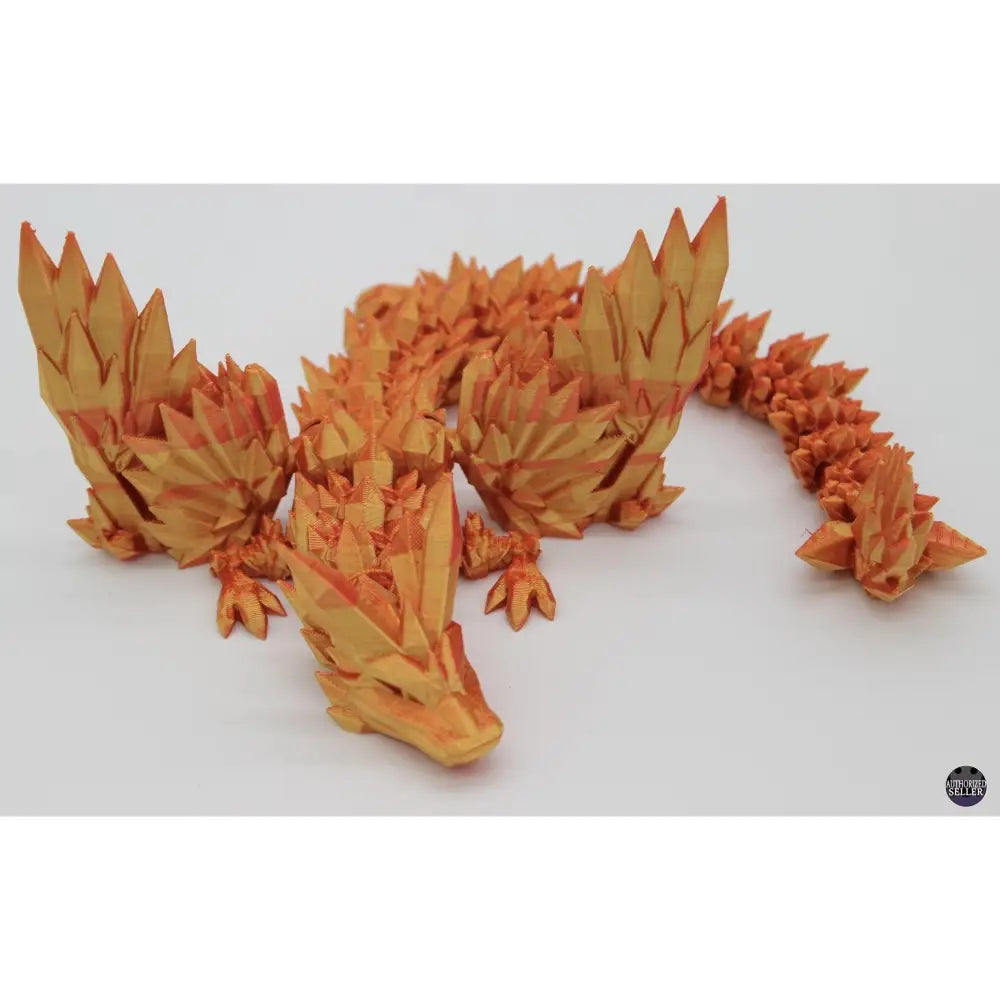 Orange, faceted dragon figurine.