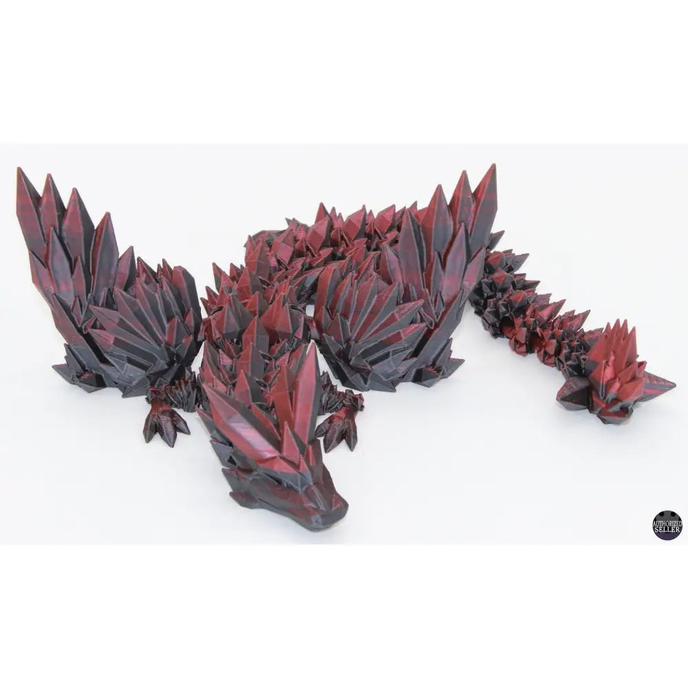 Red and black crystal dragon figurine.