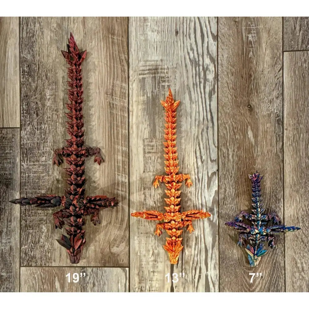 Three dragon-themed decorative swords.