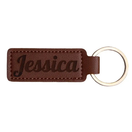 Brown leather keychain with ’Jessica’ engraved.
