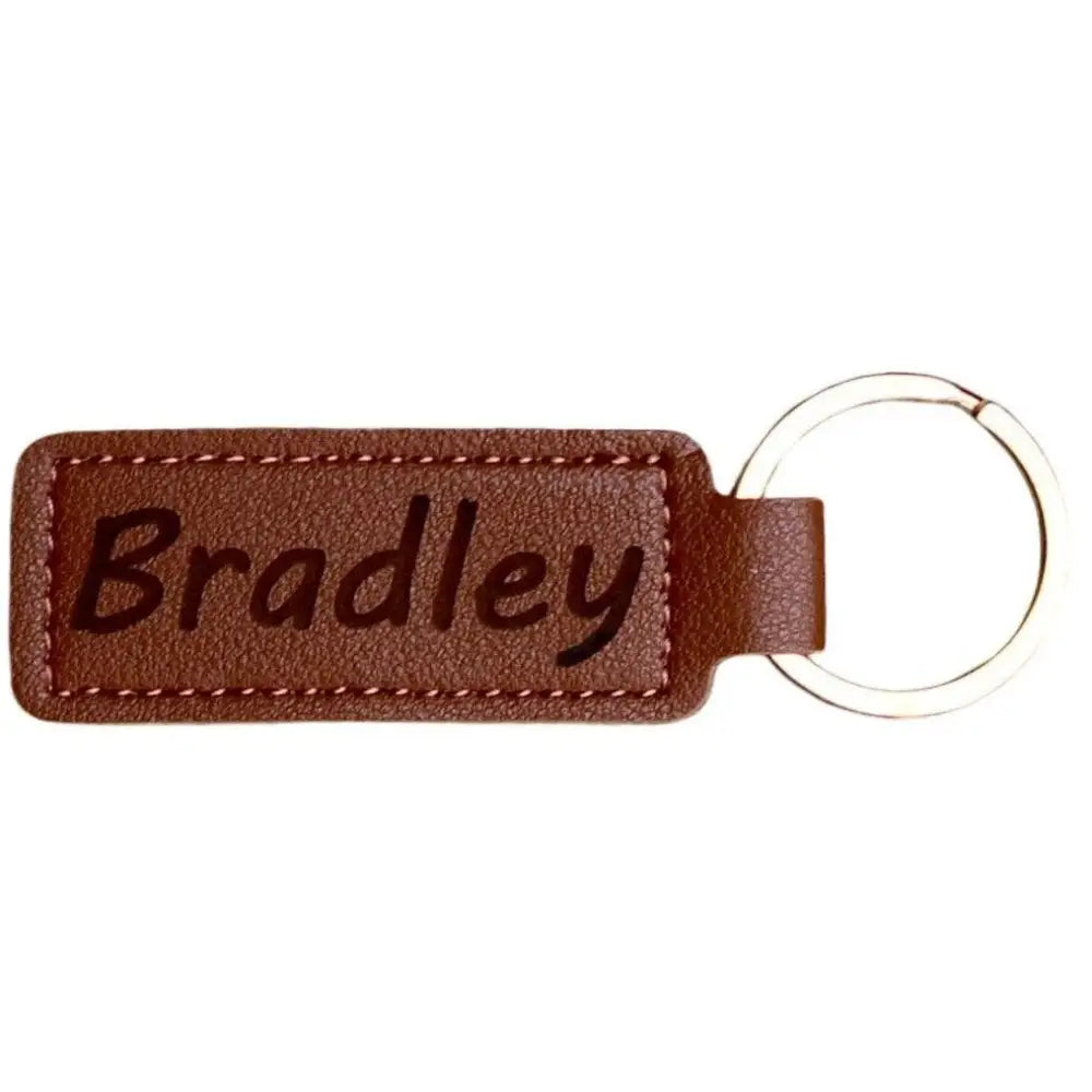Brown leather keychain with a silver ring.