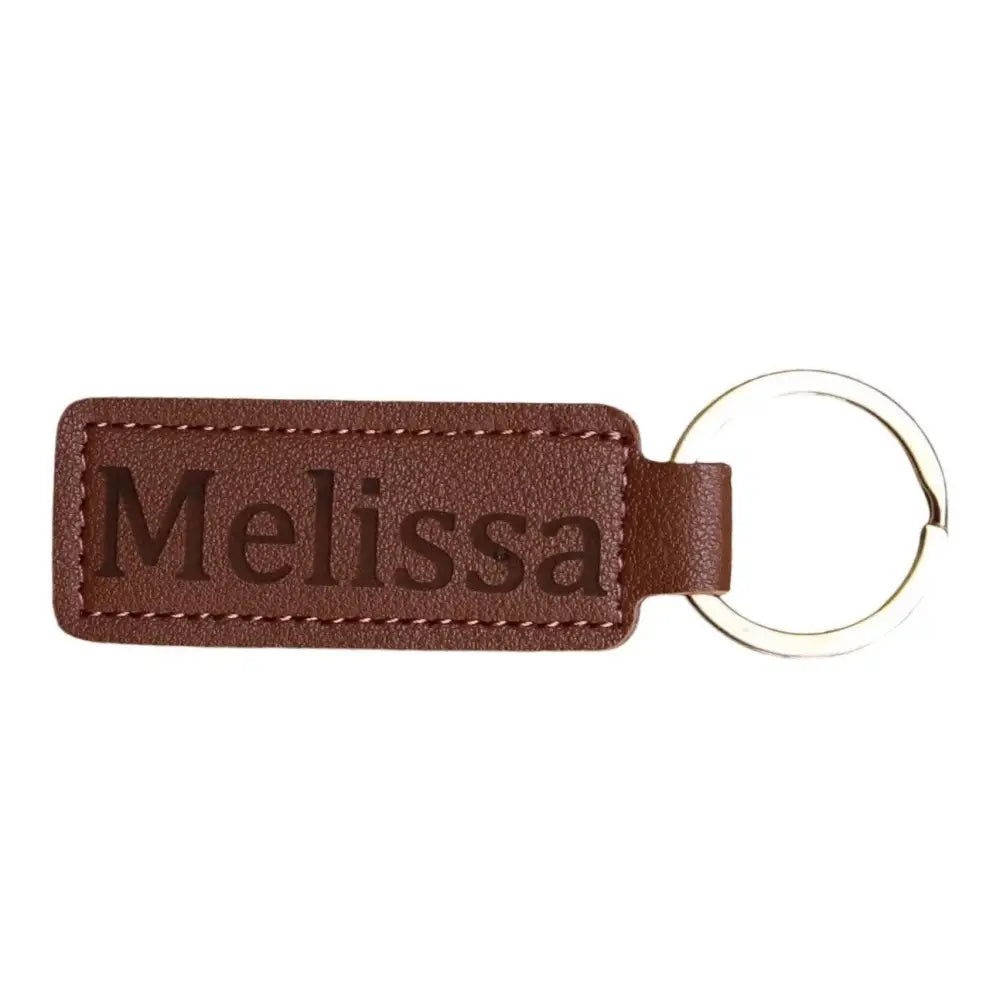 Brown leather keychain with name.