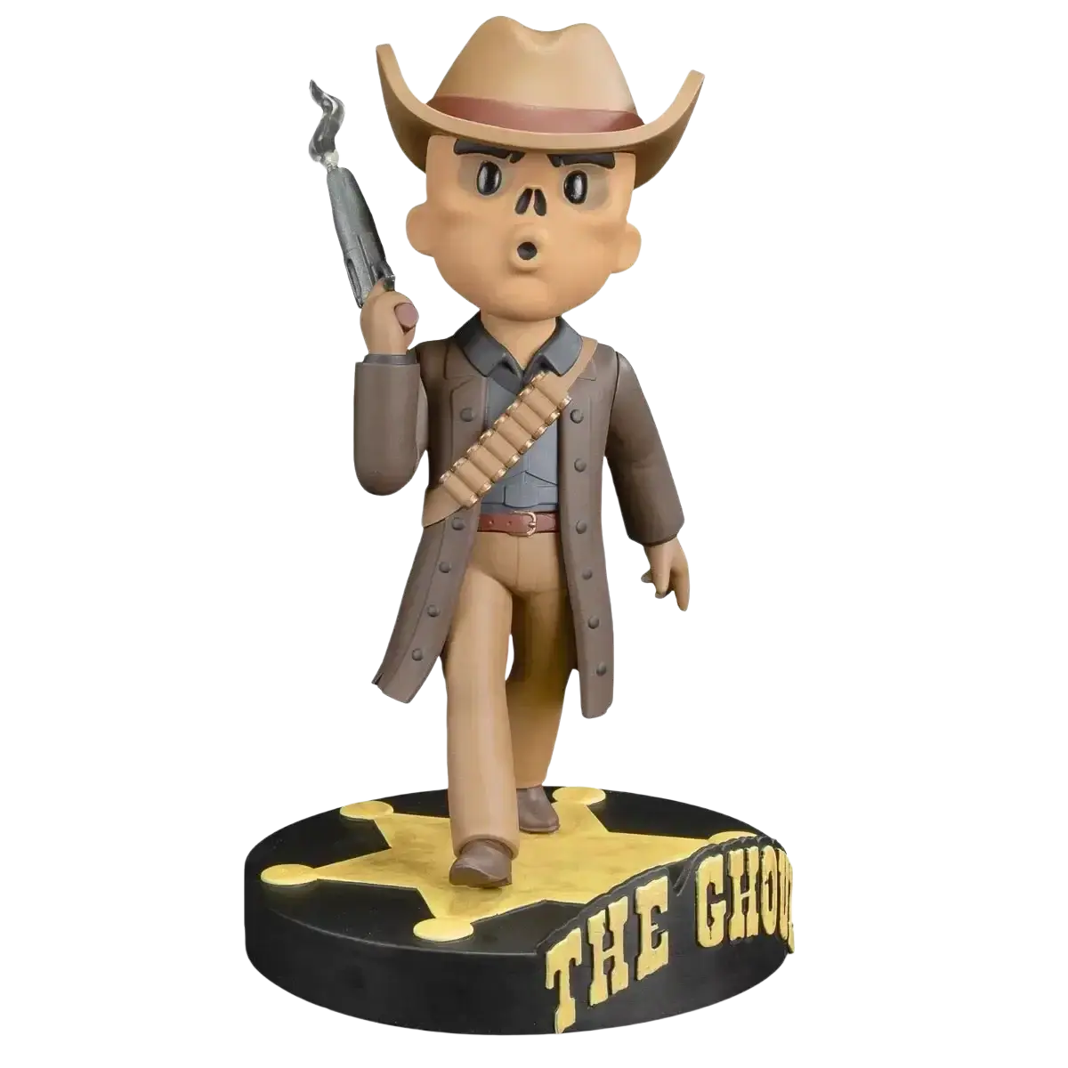 A tan cowboy-themed bobblehead figure with a skull face, holding a silver revolver and wearing a brown coat over beige pants.