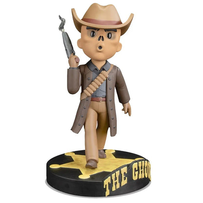 A tan cowboy-themed bobblehead figure with a skull face, holding a silver revolver and wearing a brown coat over beige pants.