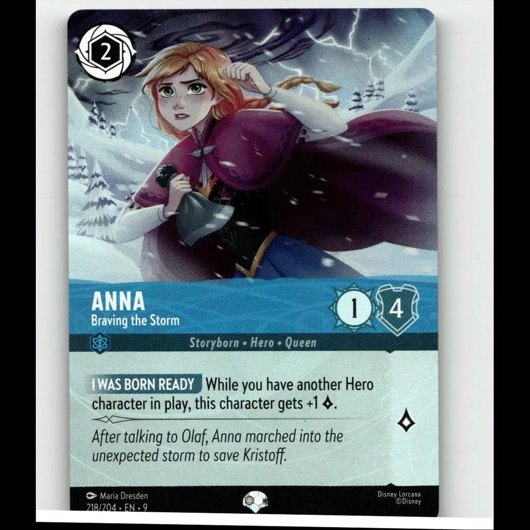 Disney lorcana anna 218/204 foil card features anna in a purple cape with reddish-brown hair against a stormy snowy background