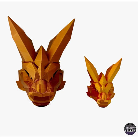 Geometric orange dragon head sculptures.