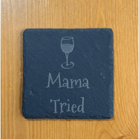 Square slate coaster with wine glass and text.