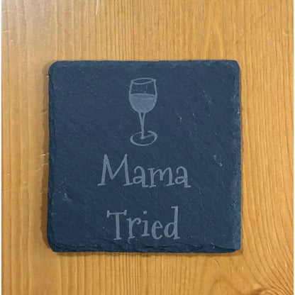 Square slate coaster with wine glass and text.