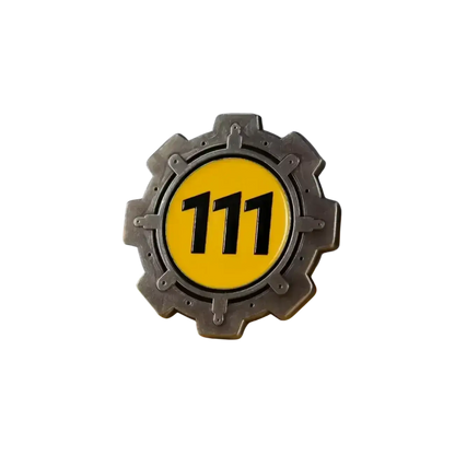 Silver gear-shaped enamel pin with bright yellow center and bold 111 number from fallout vault boy limited edition collection